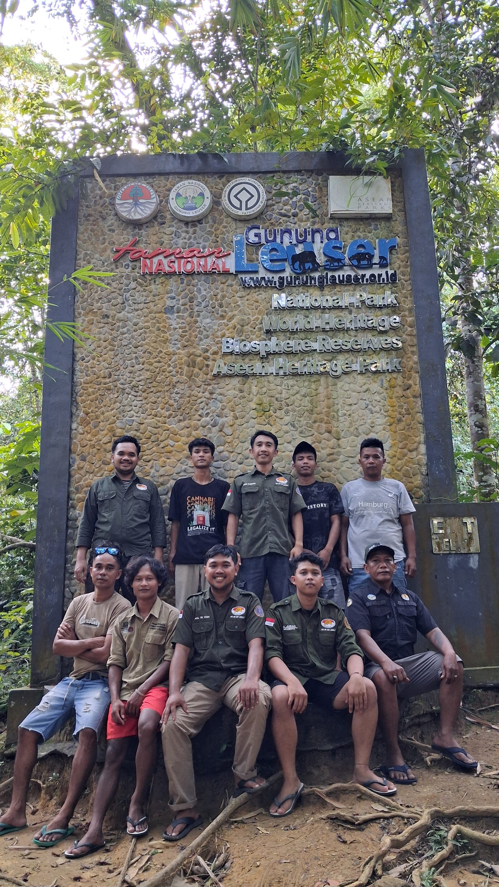 The Wild Bukit Lawang team at the Gunung Leuser National Park gate, May 2026
